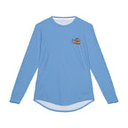 Blue long-sleeve shirt with a logo on a background of water and rocks